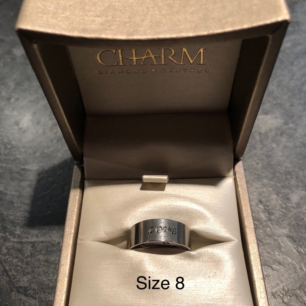 Stainless steel form fitted wedding ring love engraved
